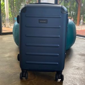 Solgaard carry on luggage/ weekend rolling suitcase.